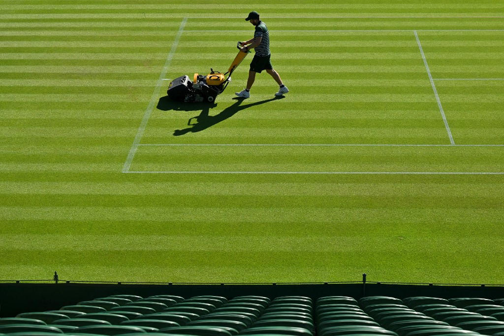 Cutting the grass at Wimbledon Tennis Courts
