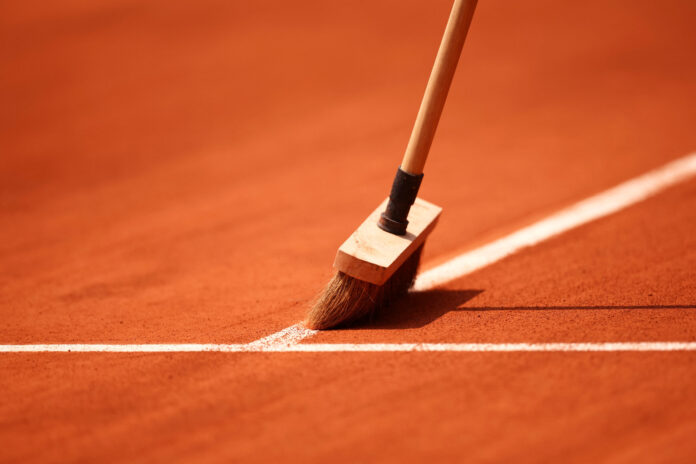 Clay Court with a broom as season starts