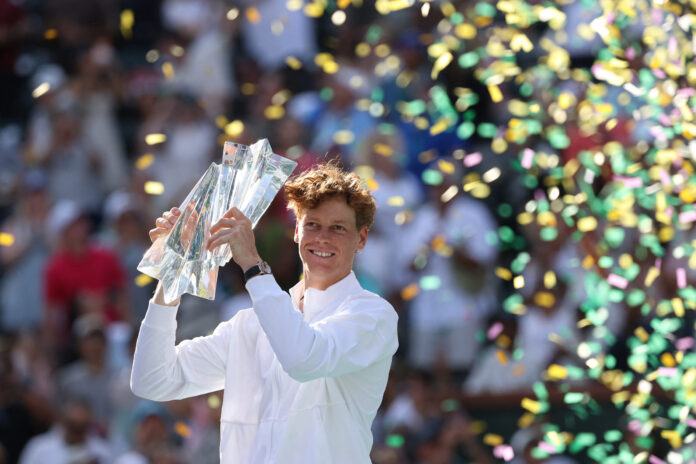 Jannik Sinner holds winning Indian Wells 2026 tournament trophy
