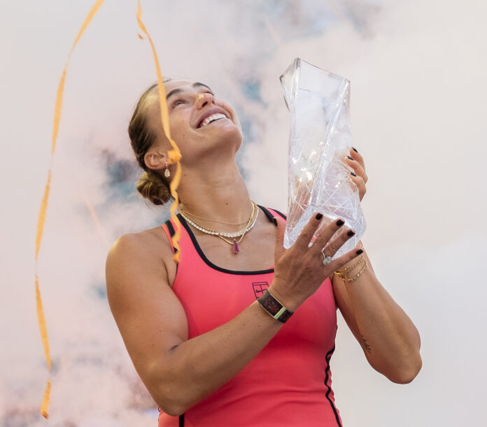 Aryna Sabalenka holds the Miami Open trophy after beating Coco Gauff in the 2026 women’s final in Miami Gardens