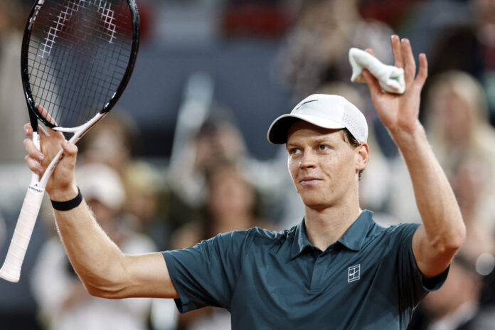 Siiner celebrates after beating Jodar at the Madrid Open