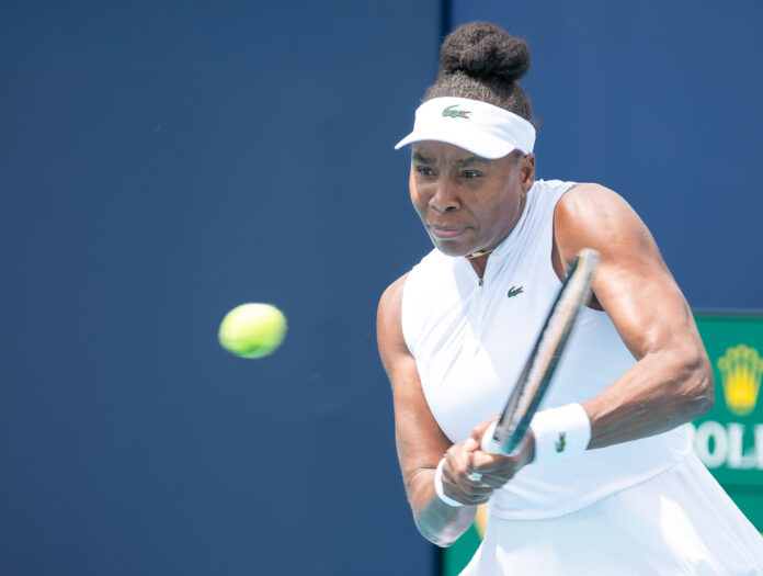 Venus Williams of the USA hits a return at the Miami Open
