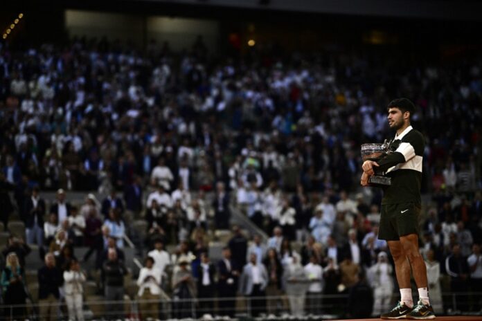 Spain's Carlos Alcaraz holds the French Open trophy