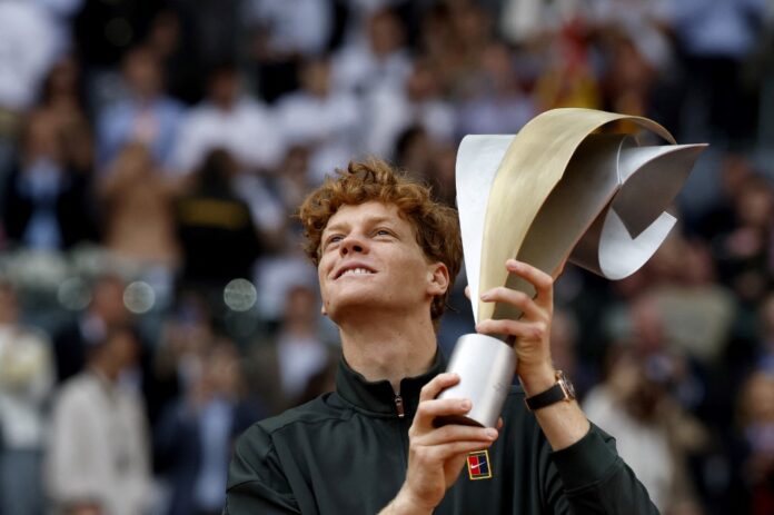 Sinner hold trophy after winning Madrid Masters