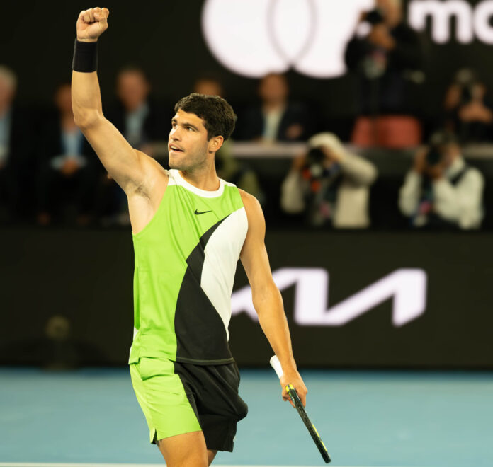 Carlos Alcaraz fist pump after winning 2026 Australian Open