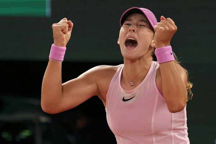 Mirra Andreeva celebrates winning her semi final match at the French Open