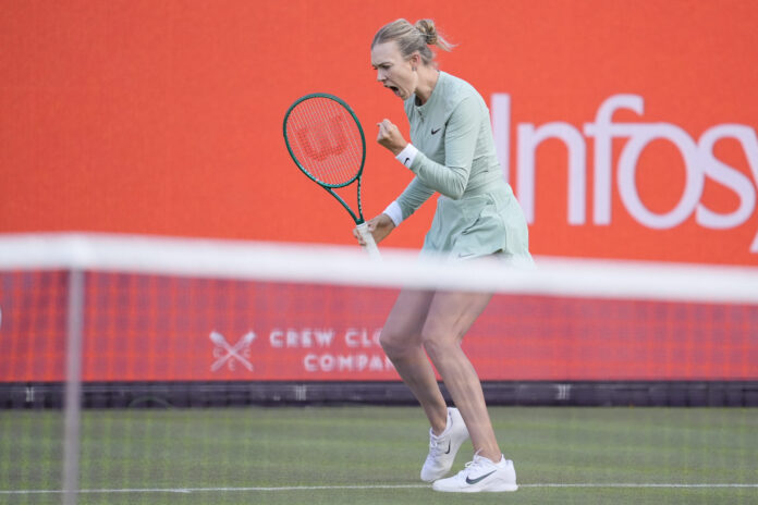 Katie Boulter celebrates a point during her Queen's Club semi-final run on grass in London