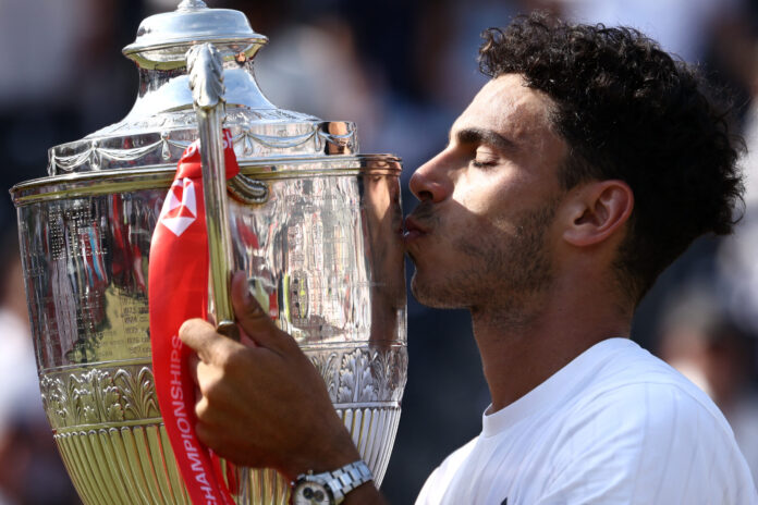 Argentine Cerundolo kisses Queens Club Tropy