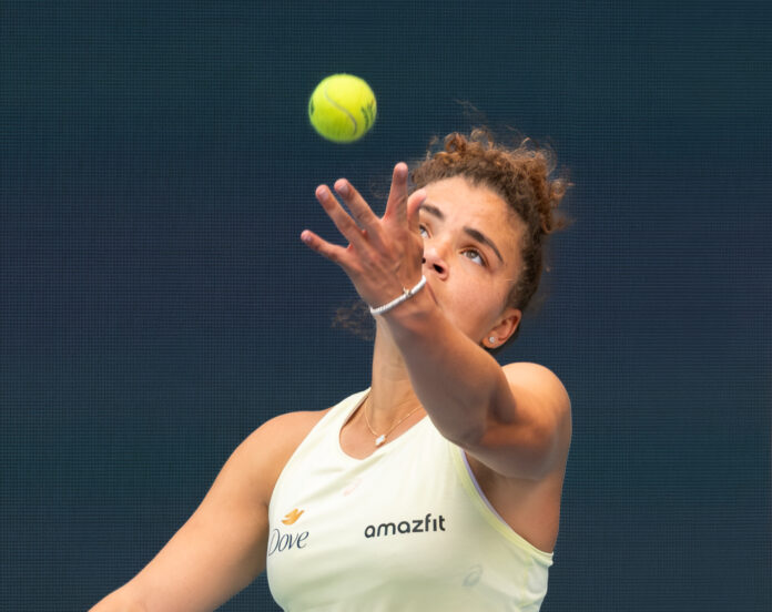 Jasmine Paolini about to serve at the Australian Open