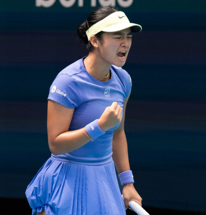 Alexandra Eala yell after winning a set at the Miami Open