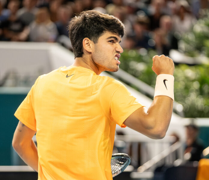 Carlos Alcaraz fist pump after winning a set in Miami