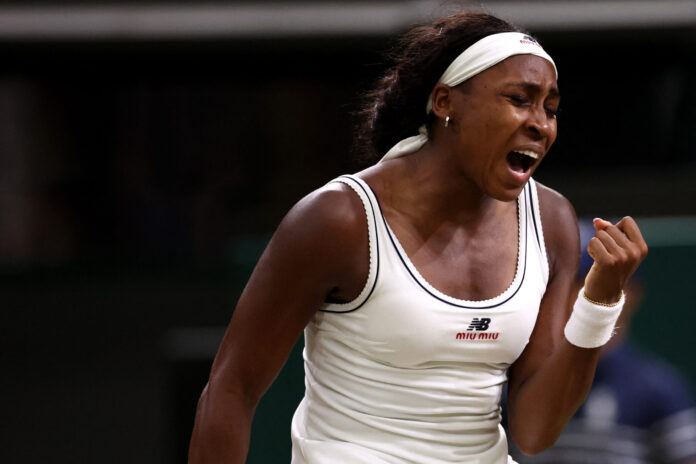 Coco Gauff celebrates winning a point at Wimbledon