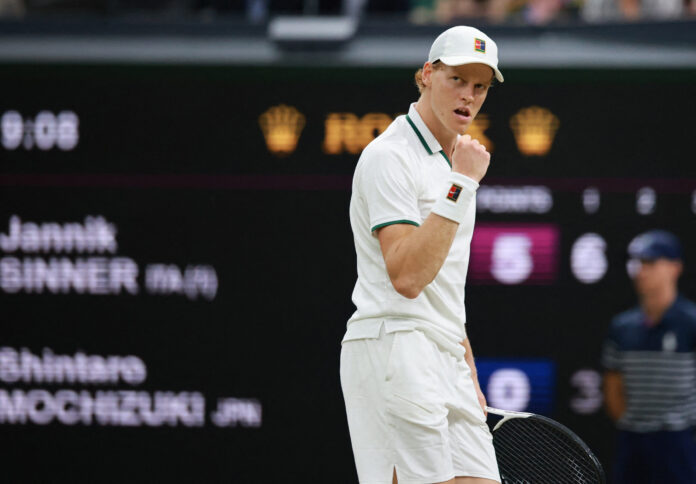 Jannik Sinner of Italy plays at Wimbledon