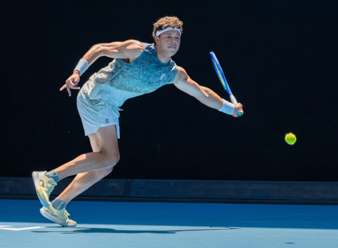 Ben Shelton reaches for a shot at the Australian Open 2026