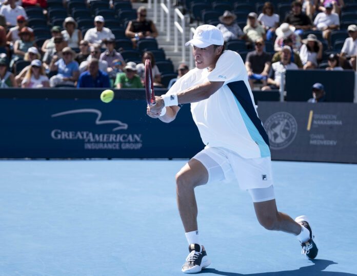 Brandon Nakashima hits a backhand on his way to beating Medvedev in Cincinnati