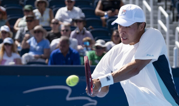 Brandon Nakashima hits the fuzz of the ball at the Cincinnati Open