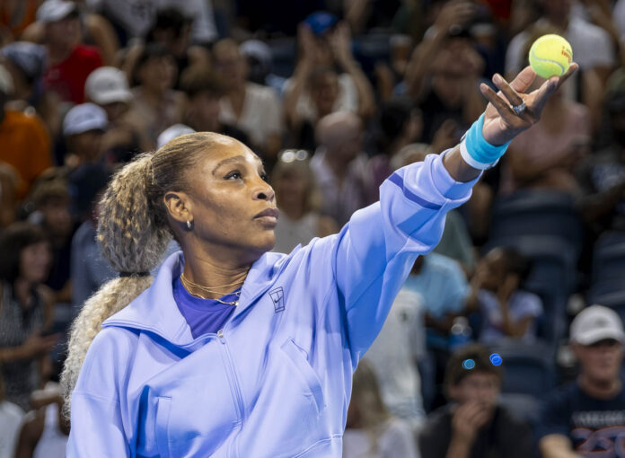 Serena Williams Serving during her doubles match at the Cincinnati Open