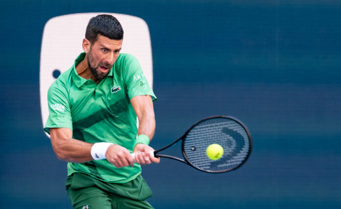 Novak Djokovic hits a backhand return at the Miami Open