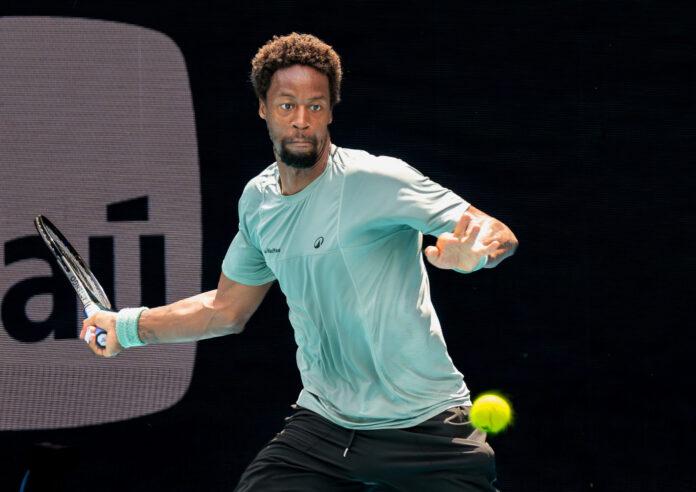 Gael Monfils hits a forehand return at the Miami Open