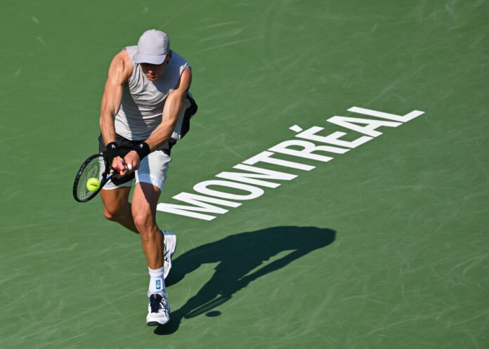 Jack Draper of Great Britain plays a backhand at thee ATP 1000 National Bank Open