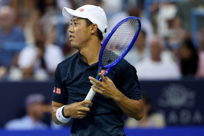 Kei Nishikori returns a shot on a hard court at the 2026 Mubadala Citi DC Open in Washington.