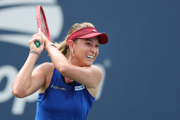 Donna Vekic of Croatia returns a shot