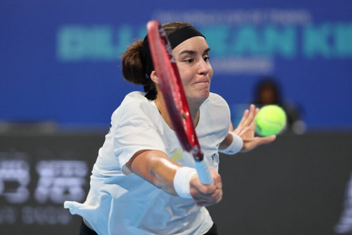 Anhelina Kalinina of Ukraine hits a return