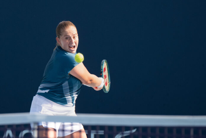 Jelena Ostapenko of Latvia hits a return at the Miami Open 2026