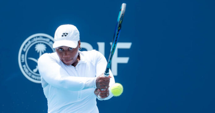 Taylor Townsend hits a return at the Miami Open