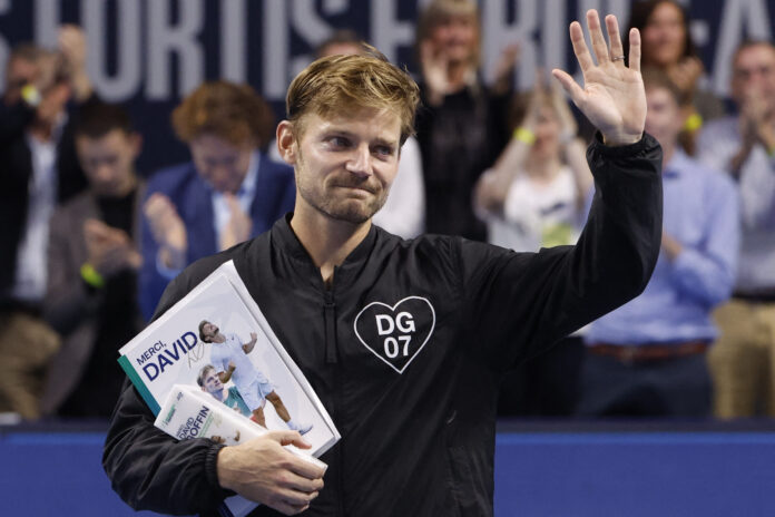 David Goffin of Belgium is honored during a farewell ceremony after the last match at the European Open ATP 250