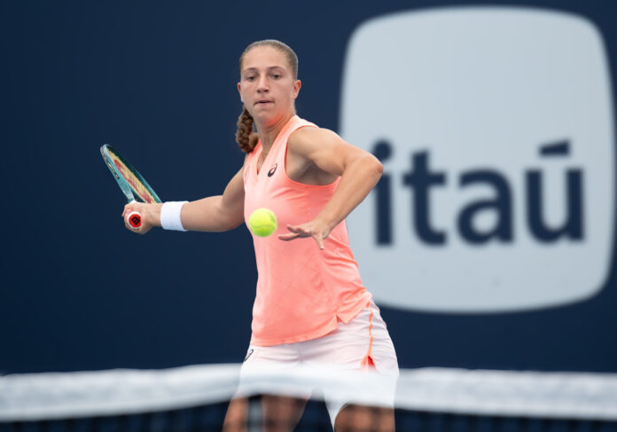 Diane Parry hits a return at the 2024 Miami Open