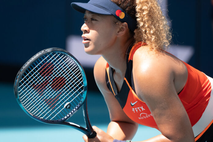 Naomi Osaka of Japan ready for a serve at the 2022 Miami Open