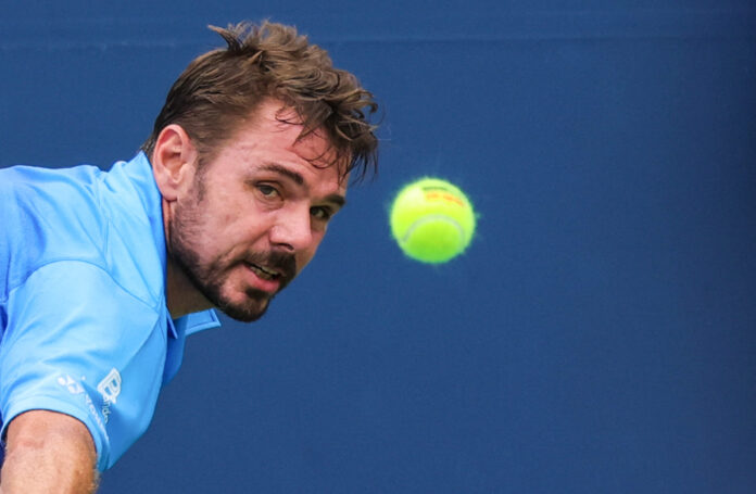 Switzerland's Stan Wawrinka hits a return at the US Open 2026