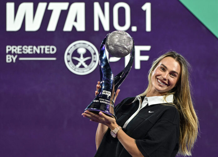Aryna Sabalenka poses with the WTA Chris Evert World No. 1 trophy